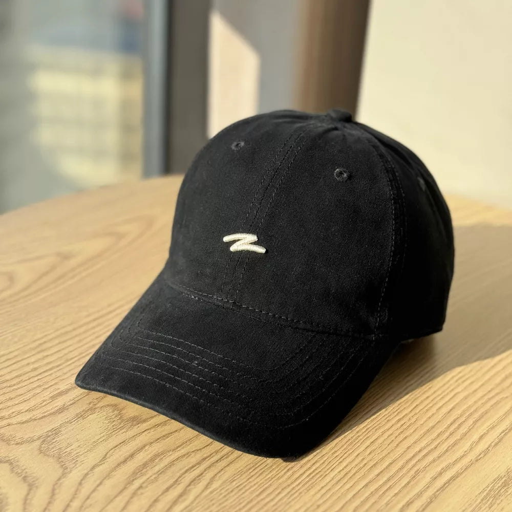 Black distressed cotton baseball hat with embroidered detail