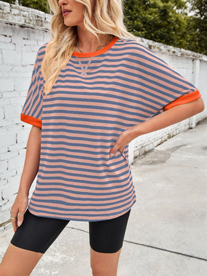 Striped Breton tee with orange trim and crew neck.