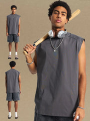 Boxy shoulder cut tank top in dark gray with a relaxed fit.