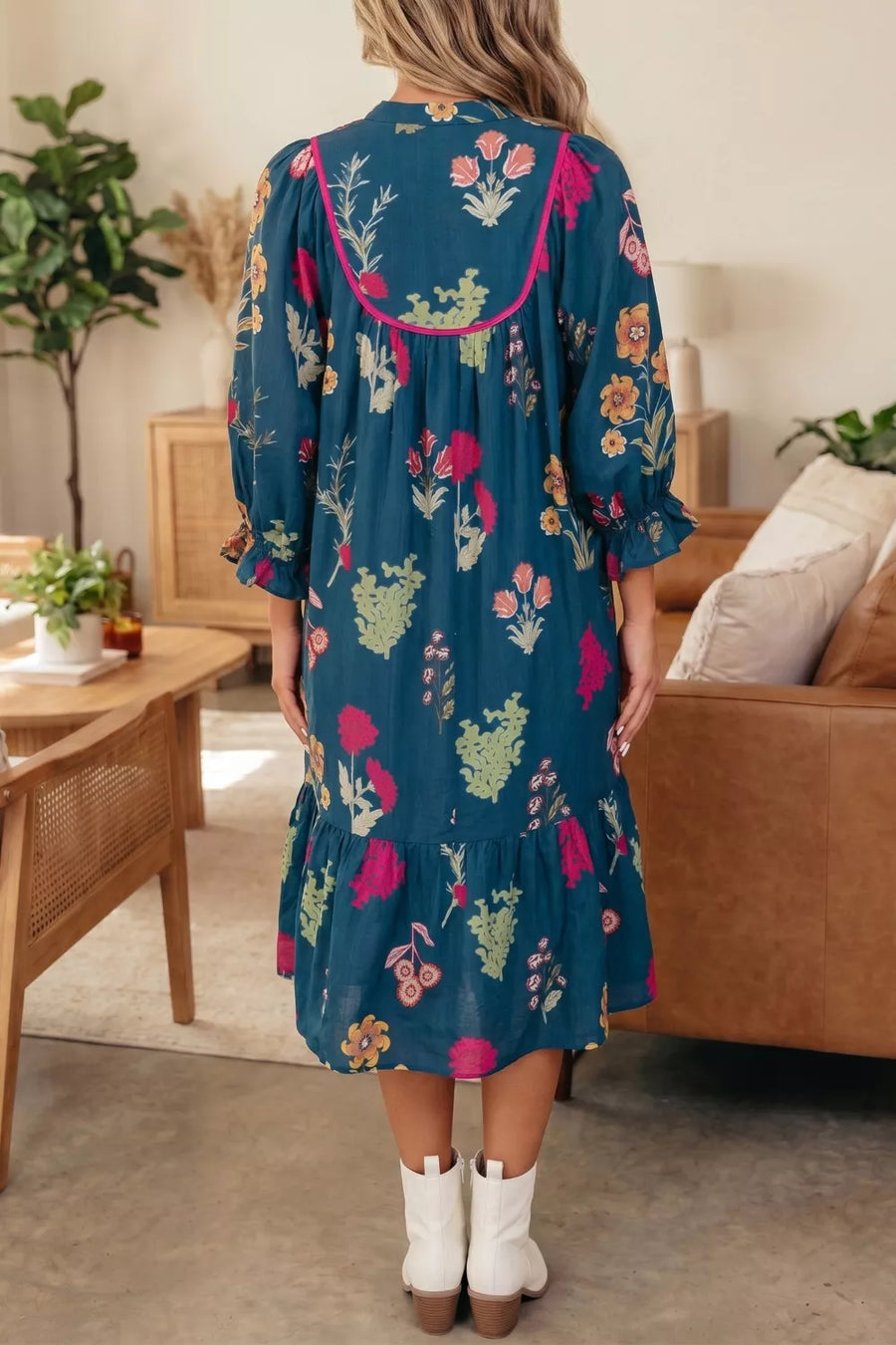 Teal floral print midi dress with pink trim, puff sleeves, and tiered ruffle hem.