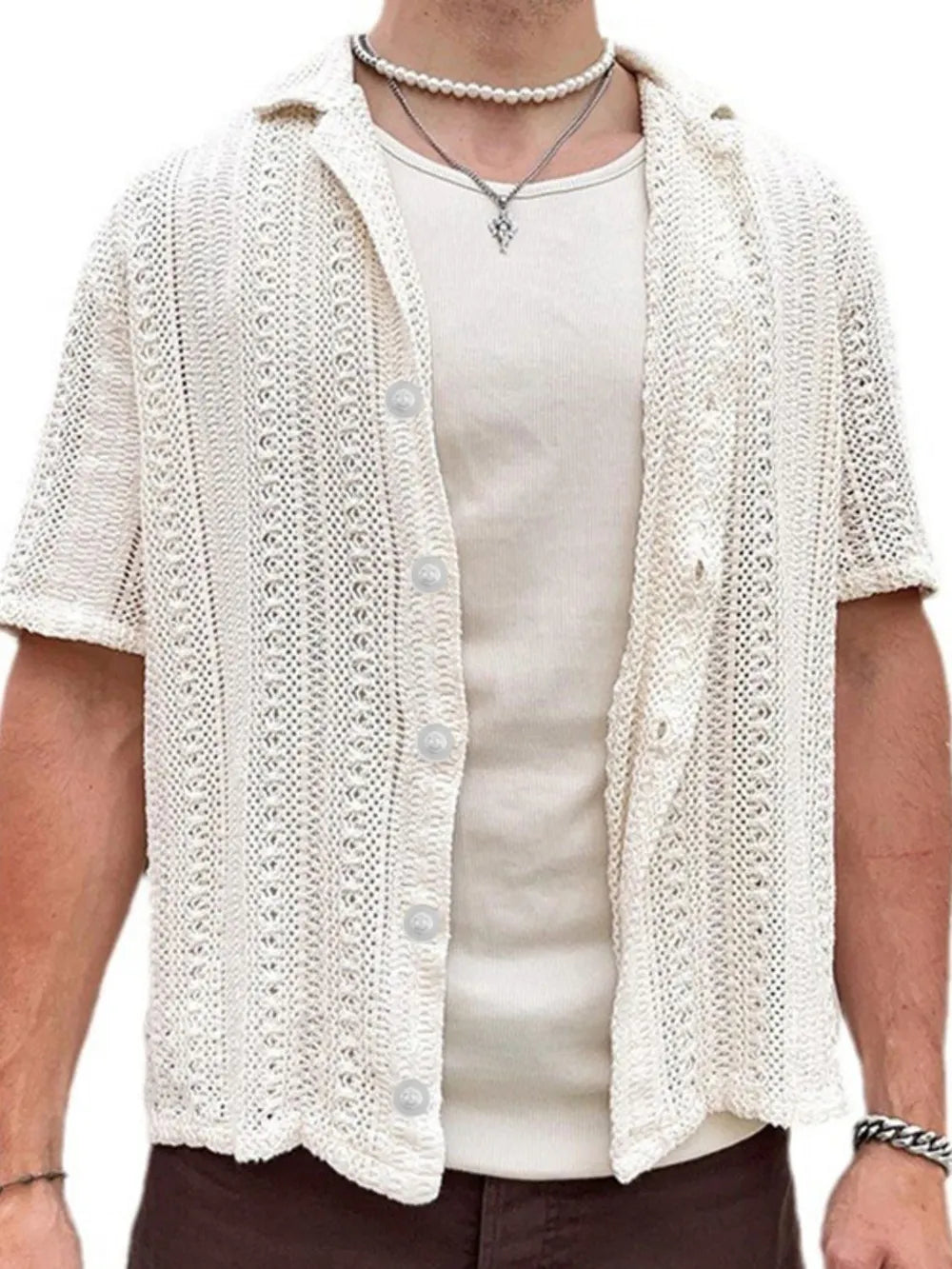 Open-knit resort shirt in white with button-down front and short sleeves.