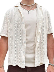 Open-knit resort shirt in white with button-down front and short sleeves.