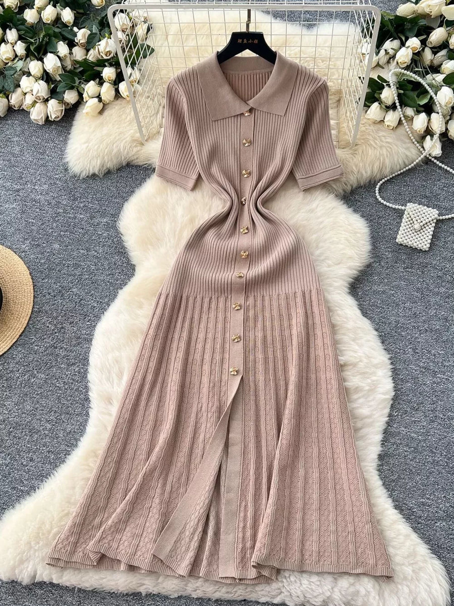 Khaki knit dress with Peter Pan collar, short sleeves, and button front detail.