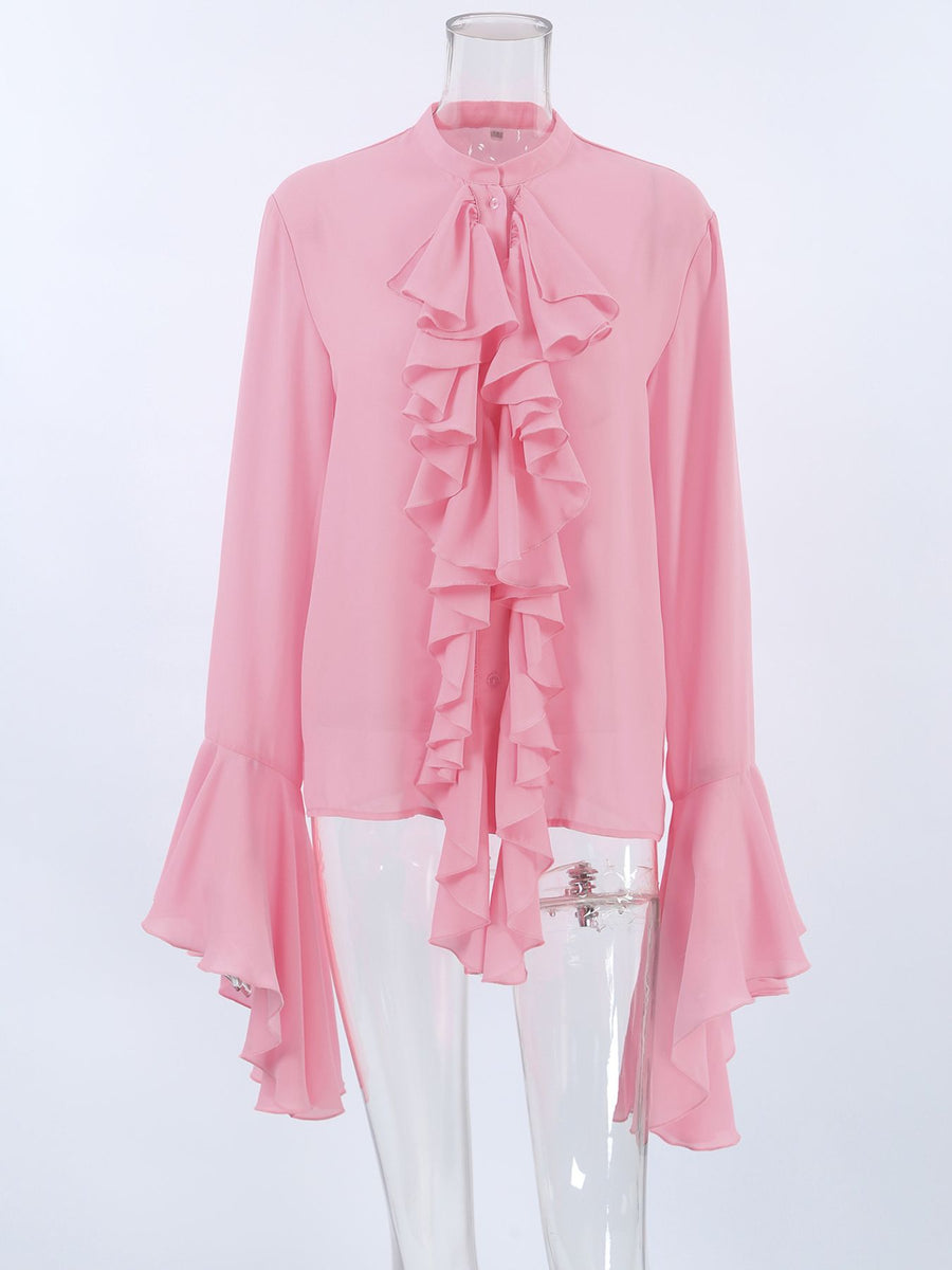 Pink ruffled flounce sleeve blouse with buttoned front and high neckline.
