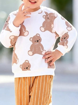 95% cotton, 5% polyester Care instructions: Machine wash cold lounge set in brown with relaxed top, wide-leg pants silhouette