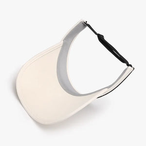 Textured visor in Ivory with contrast piping and black adjustable strap.
