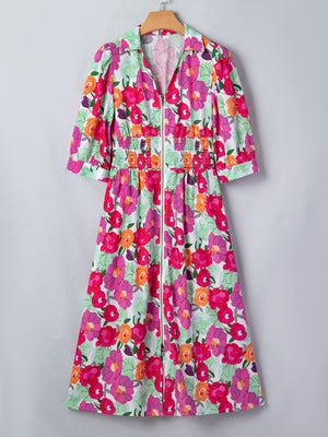Floral V-neck zip midi dress with smocked waist and puff sleeves.