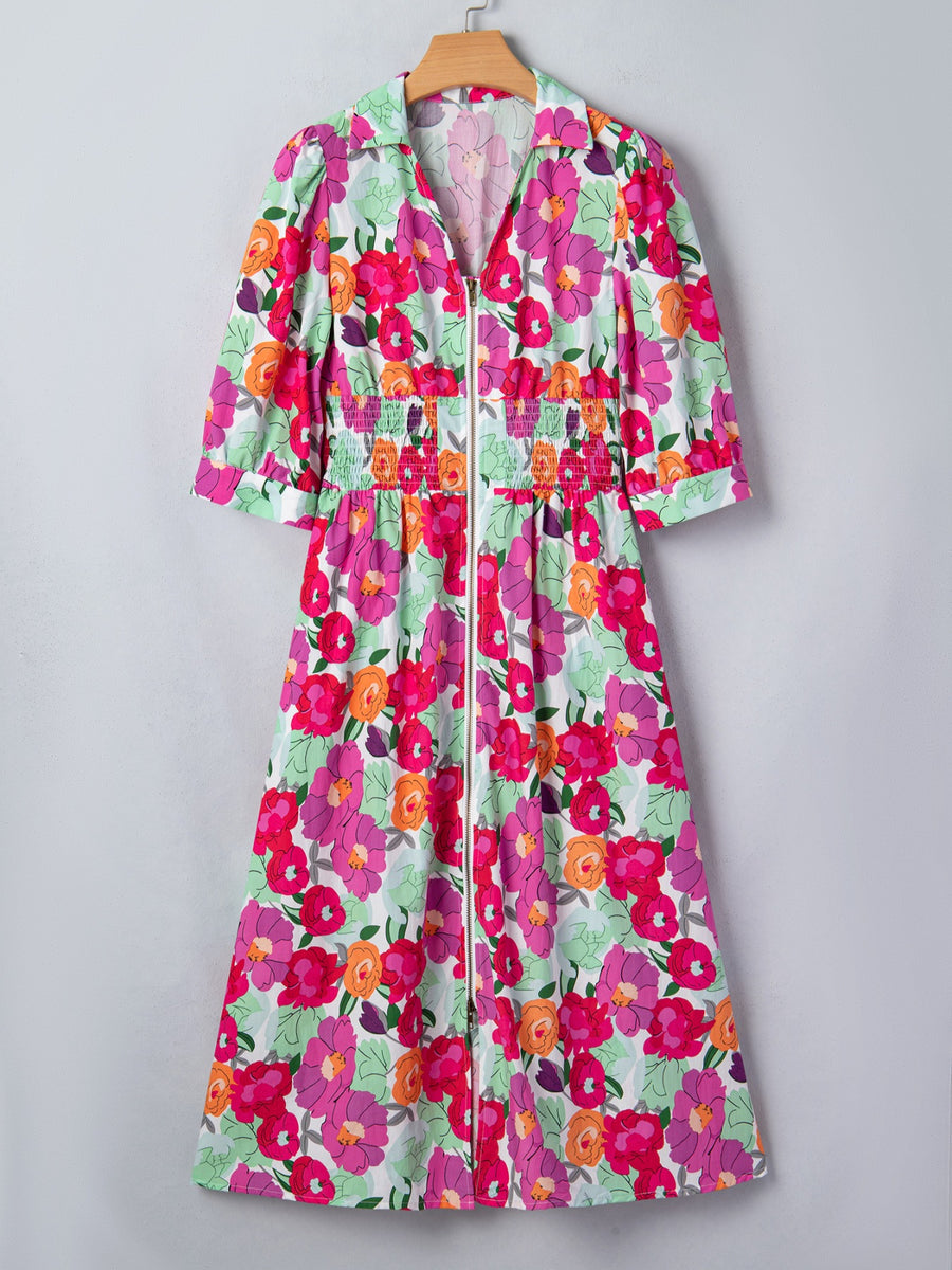 Floral V-neck zip midi dress with smocked waist and puff sleeves.