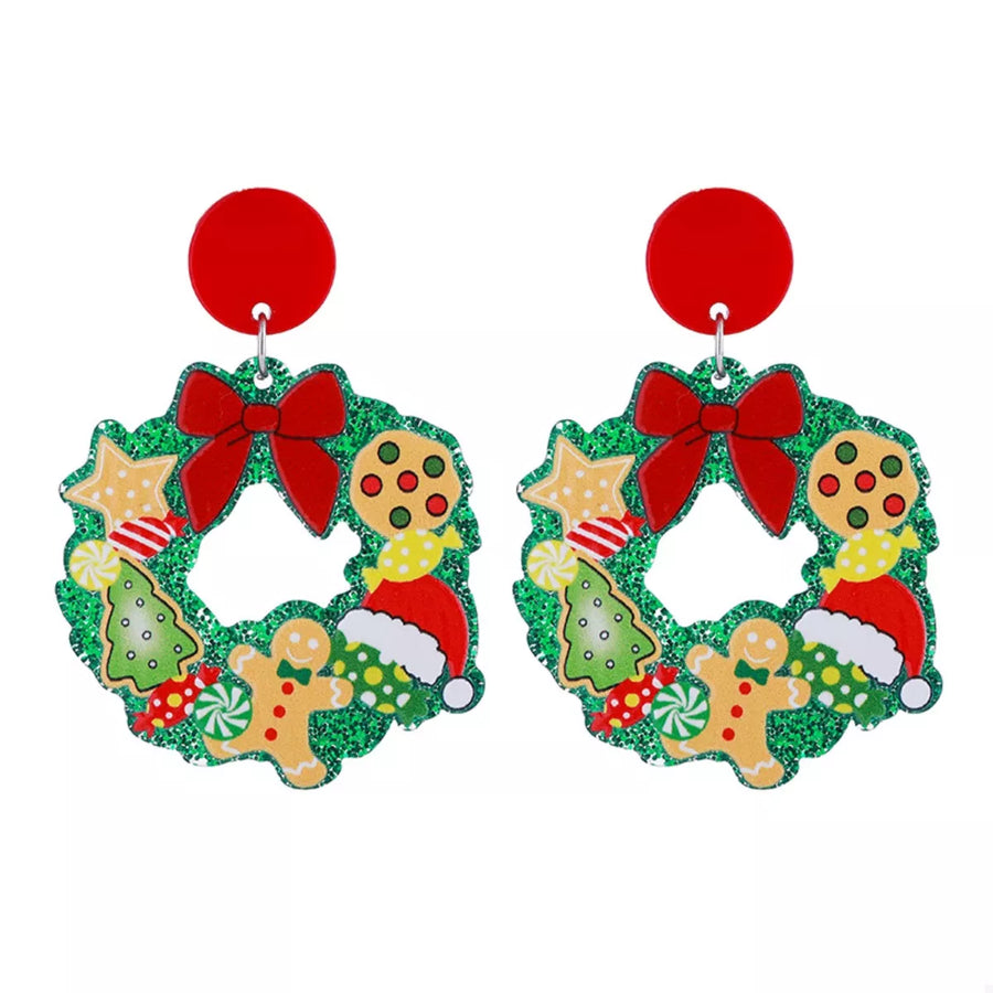 Festive Christmas wreath dangle earrings with gingerbread men, trees, and candy.