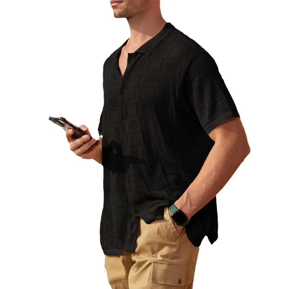 Black open-knit resort shirt with geometric texture, button-down front, and spread collar.