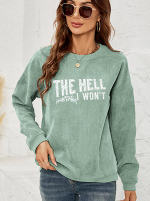 Textured corduroy crewneck sweatshirt in Gum Leaf with graphic text and floral detail.
