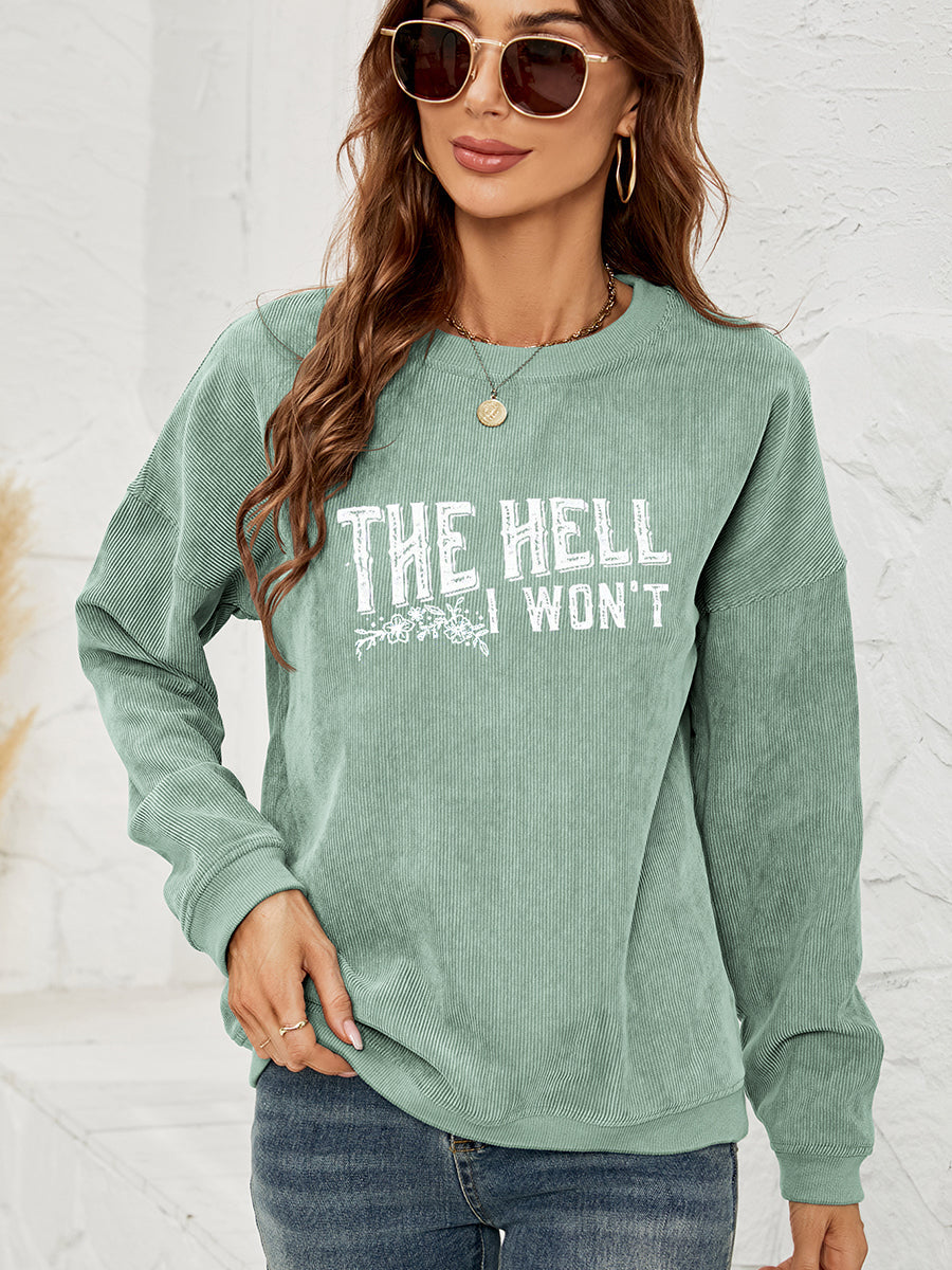 Textured corduroy crewneck sweatshirt in Gum Leaf with graphic text and floral detail.