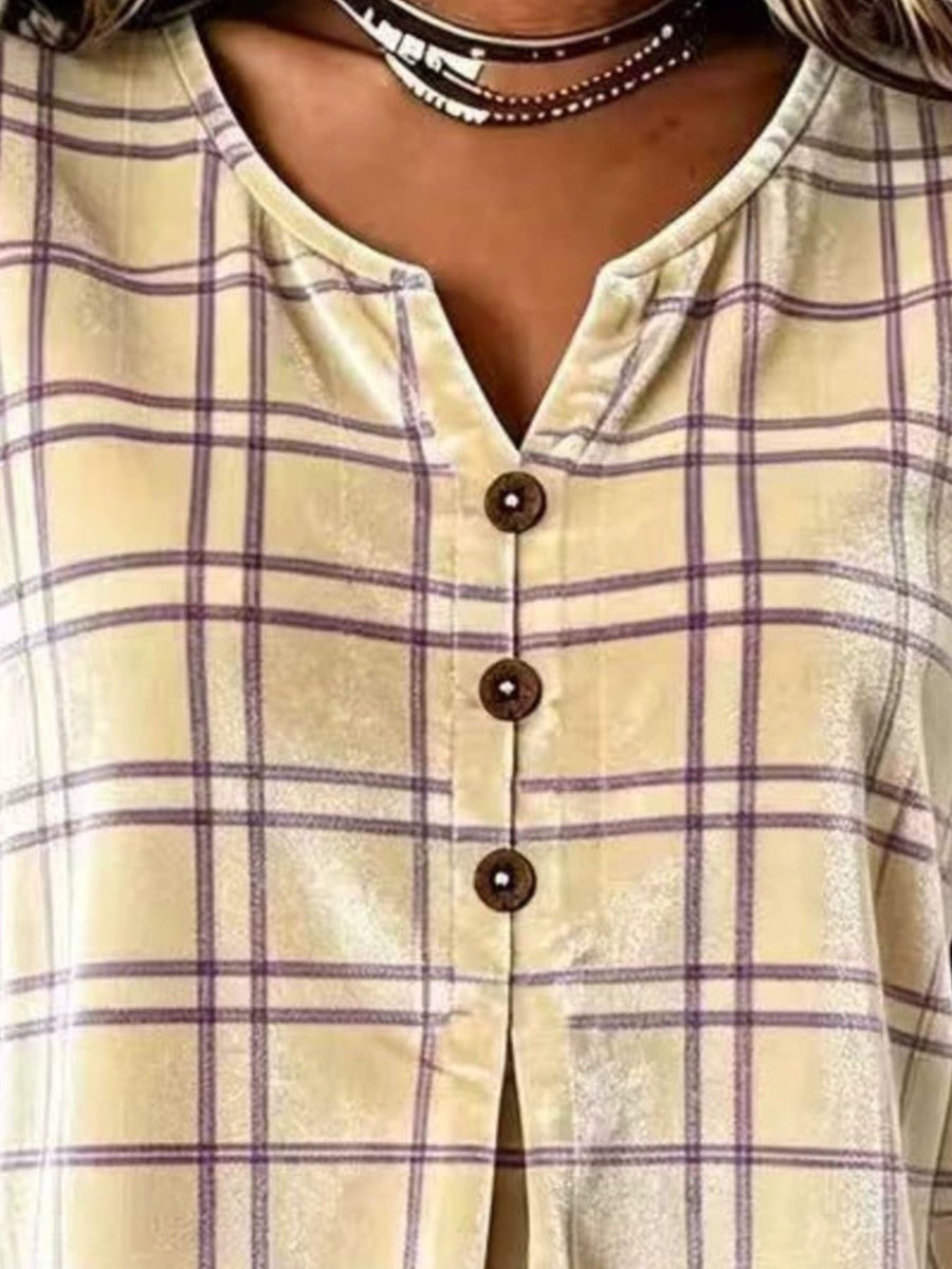 purple blouse featuring ruffled and plaid