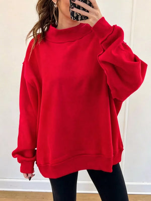 50% viscose, 50% polyester Care instructions: Machine wash cold sweatshirt in Deep Red with oversized silhouette