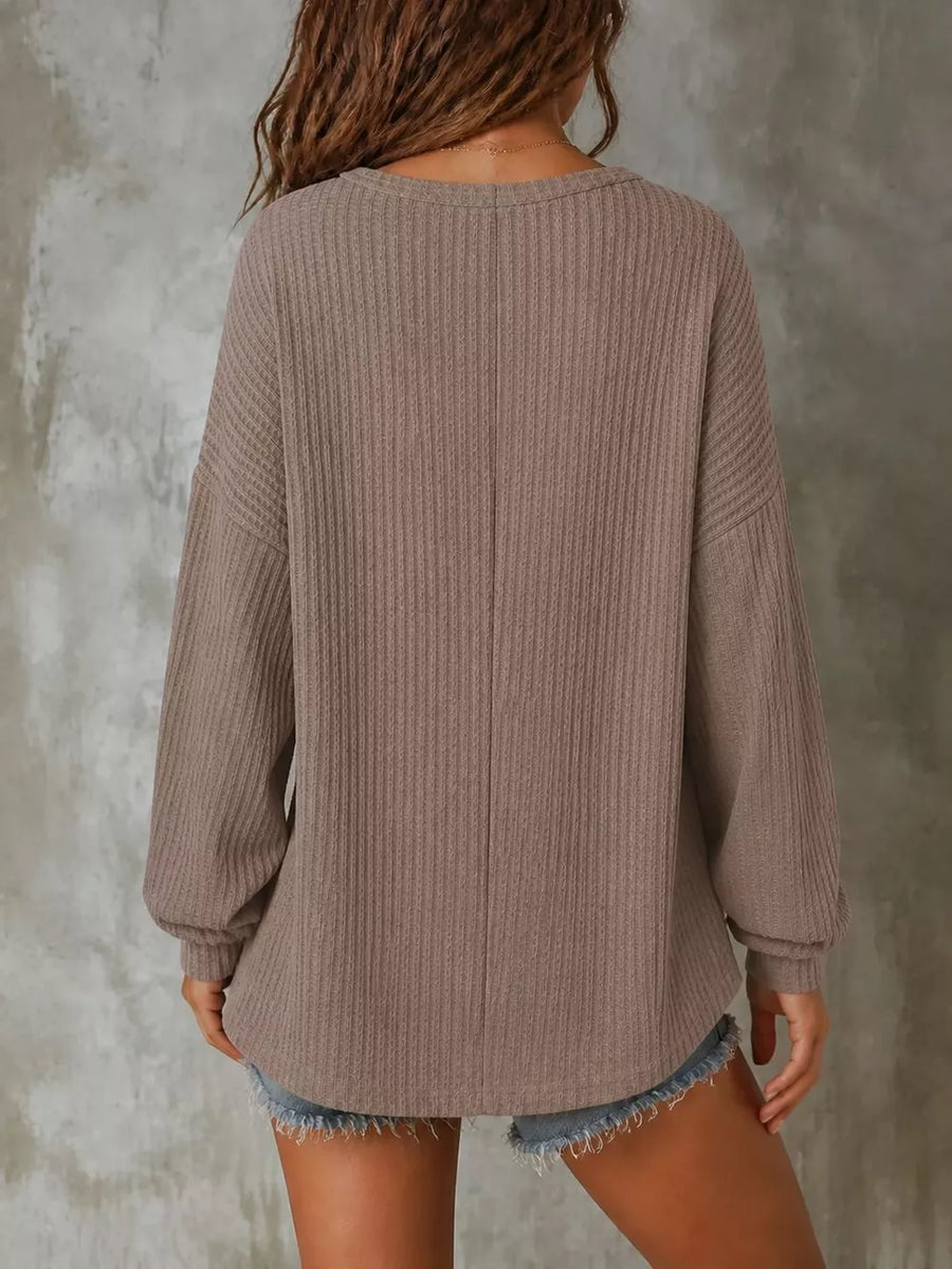 Taupe henley featuring buttoned placket and waffle knit