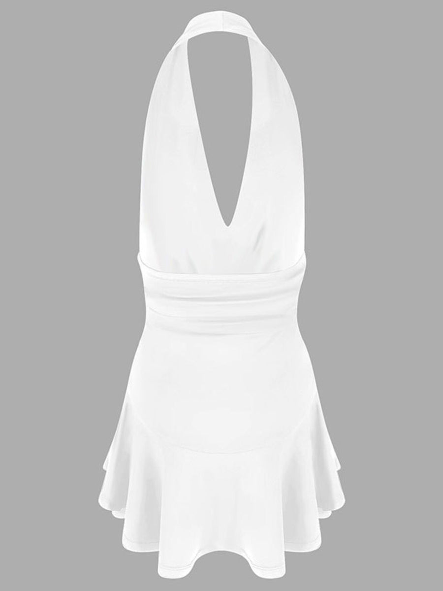White halter dress with plunging V-neck and ruffle hem