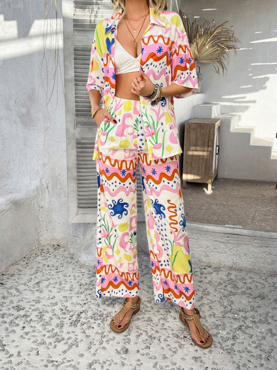 Women's abstract print wide-leg pants in multicolor, featuring a button front and casual resort style.