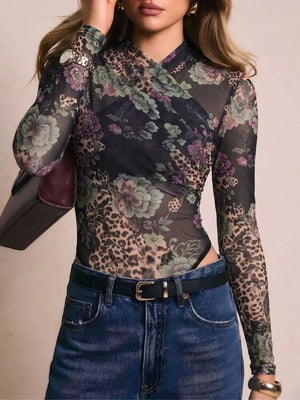 95% polyester, 5% elastane Care instructions: Machine wash cold bodysuit in deep purple with fitted silhouette