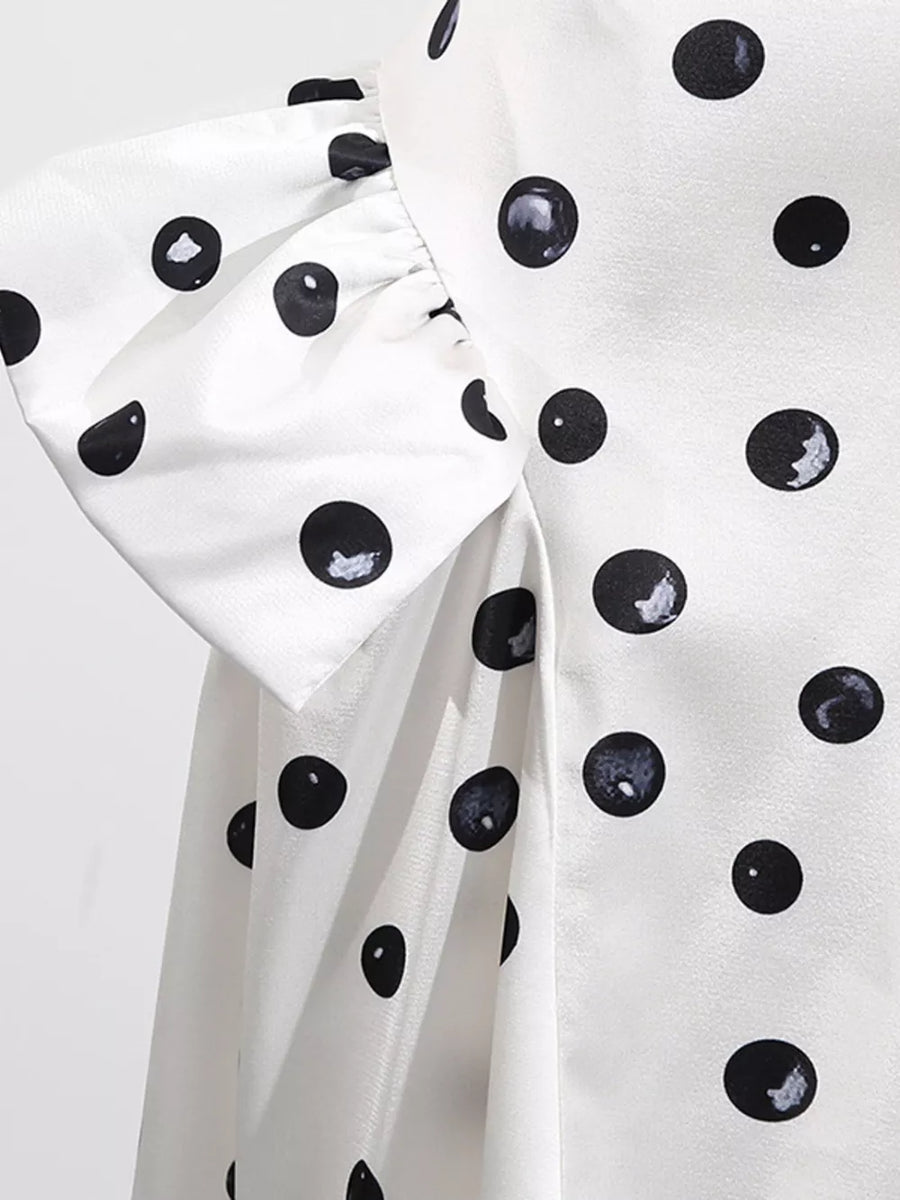 White polka dot dress with ruffled short sleeves