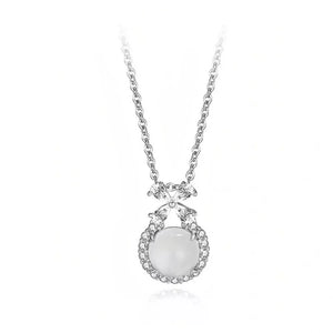 Sterling silver pendant necklace with white chalcedony and clear crystal accents.