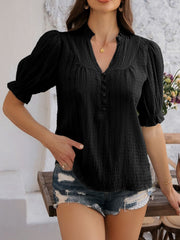 Black textured puff sleeve blouse with button-down front and V-neck.