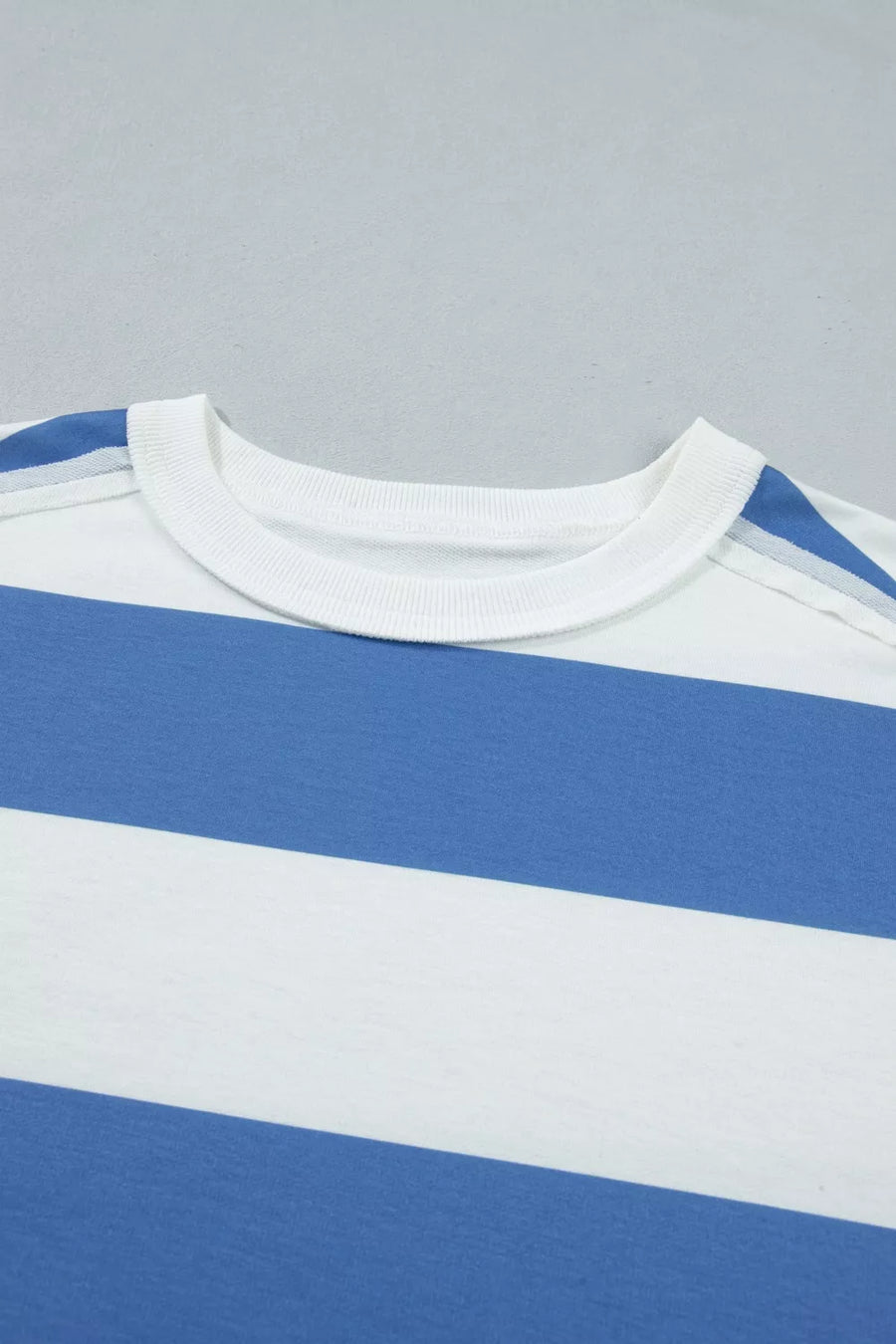 T-shirt dress with blue and white horizontal stripes and crew neck.
