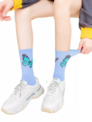 socks in Blue with butterfly-print and elastic cuff