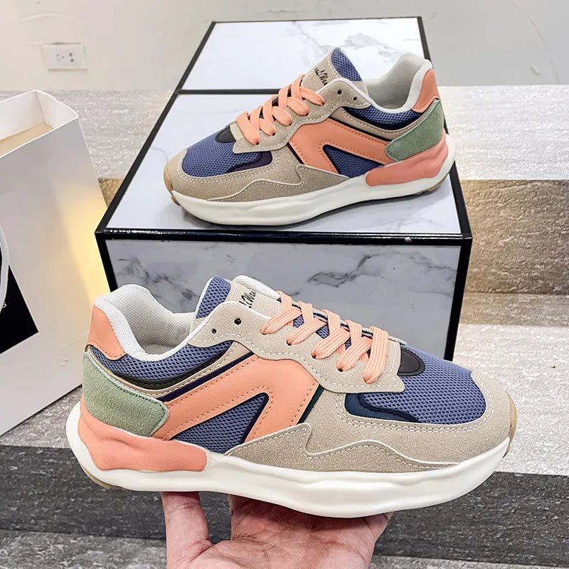 Panelled retro runner sneakers in beige, blue, peach, and green suede and mesh with peach laces.