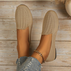 black flats with slip-on and geometric