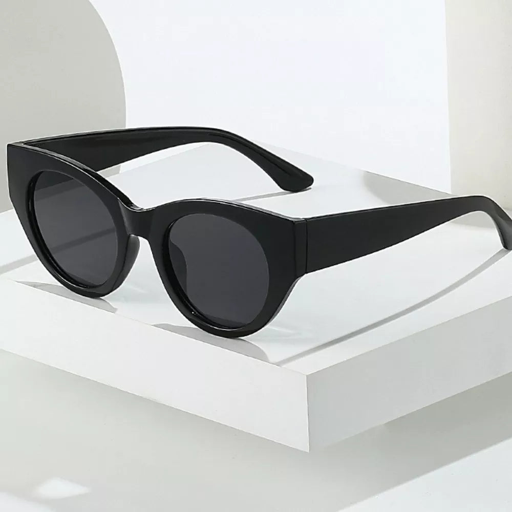 black sunglasses featuring UV400 protection and leopard-print