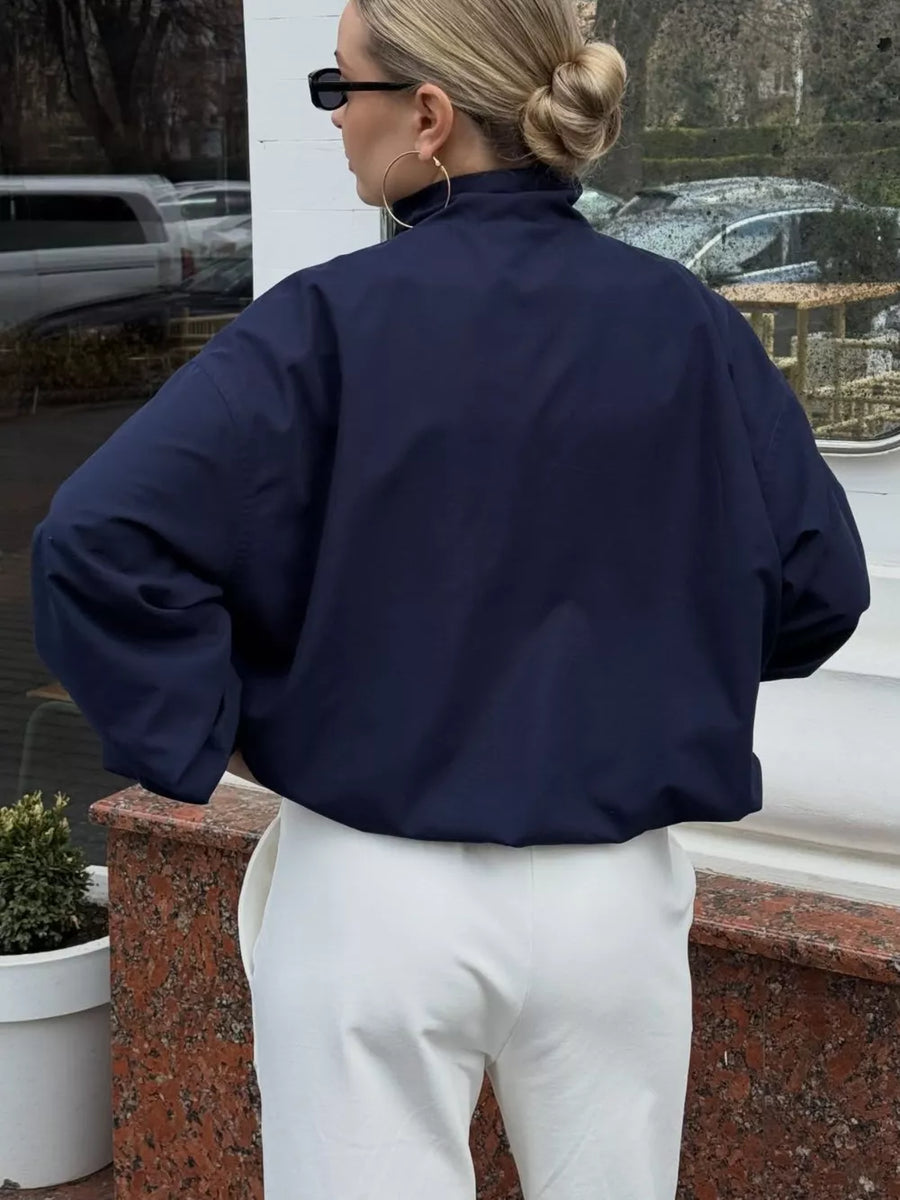 athleisure windbreaker in navy blue with mock neck