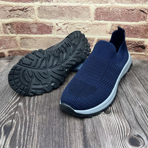 Blue breathable knit slip-on sneakers with round toe and textured sole.