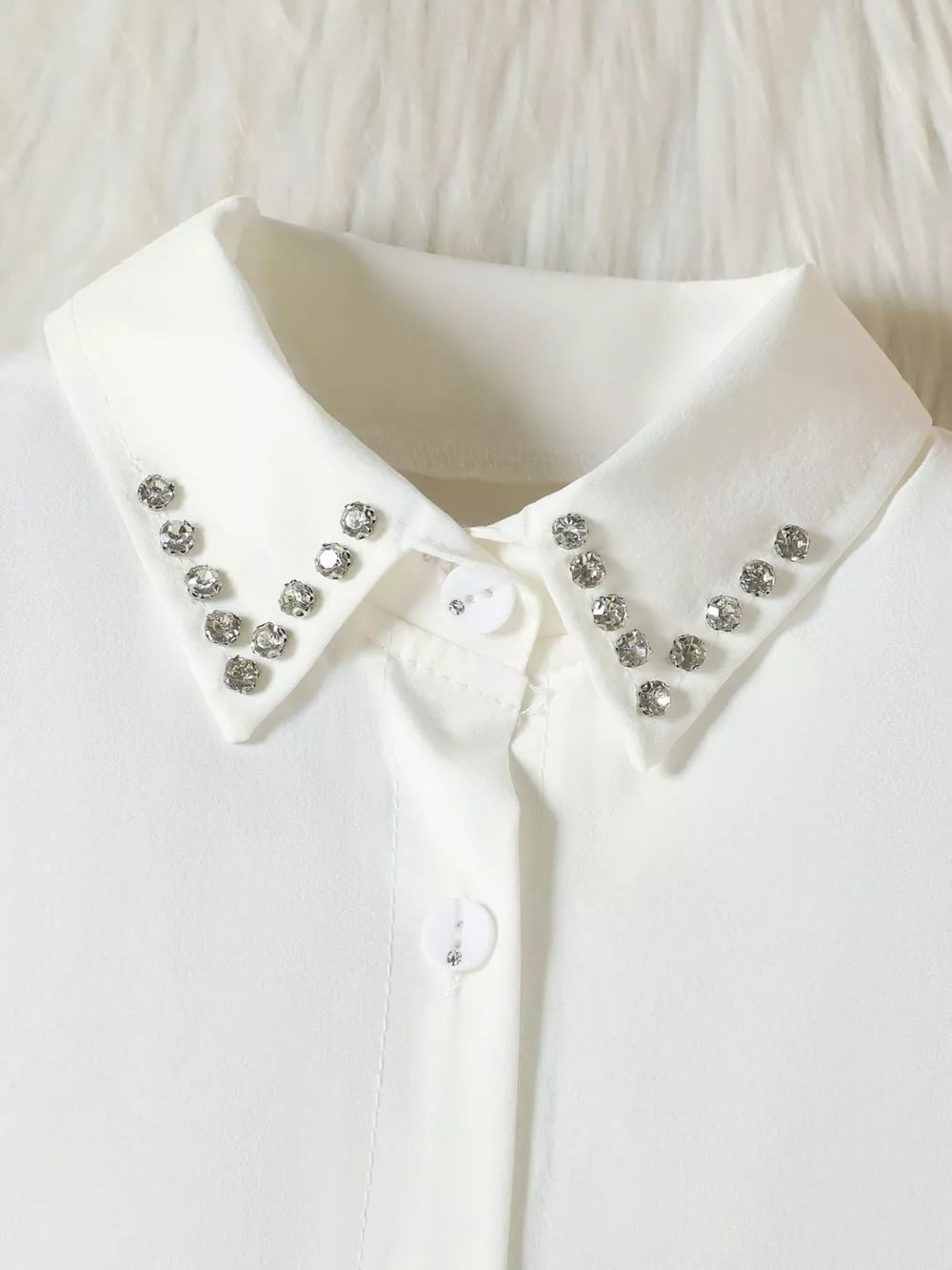 White toddler collar shirt with rhinestone trim and decorative button detail