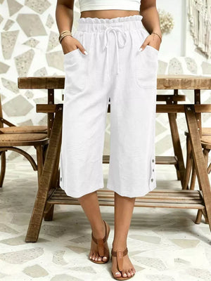 capri in white featuring drawstring waist and relaxed fit