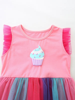 Pink cotton dress with cupcake graphic and ruffled tulle sleeves, rainbow tulle skirt.