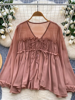 Apricot chiffon blouse with ruffled tie-front and V-neckline