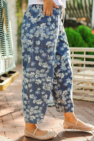 Floral drawstring barrel jeans with pockets in blue denim.