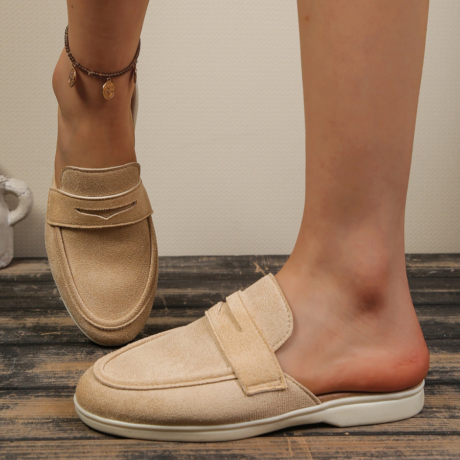 Khaki textured round toe slip-on loafers with decorative strap detail.
