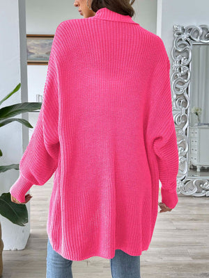 Ribbed knit cocoon cardigan in bright pink with a relaxed fit and balloon sleeves.