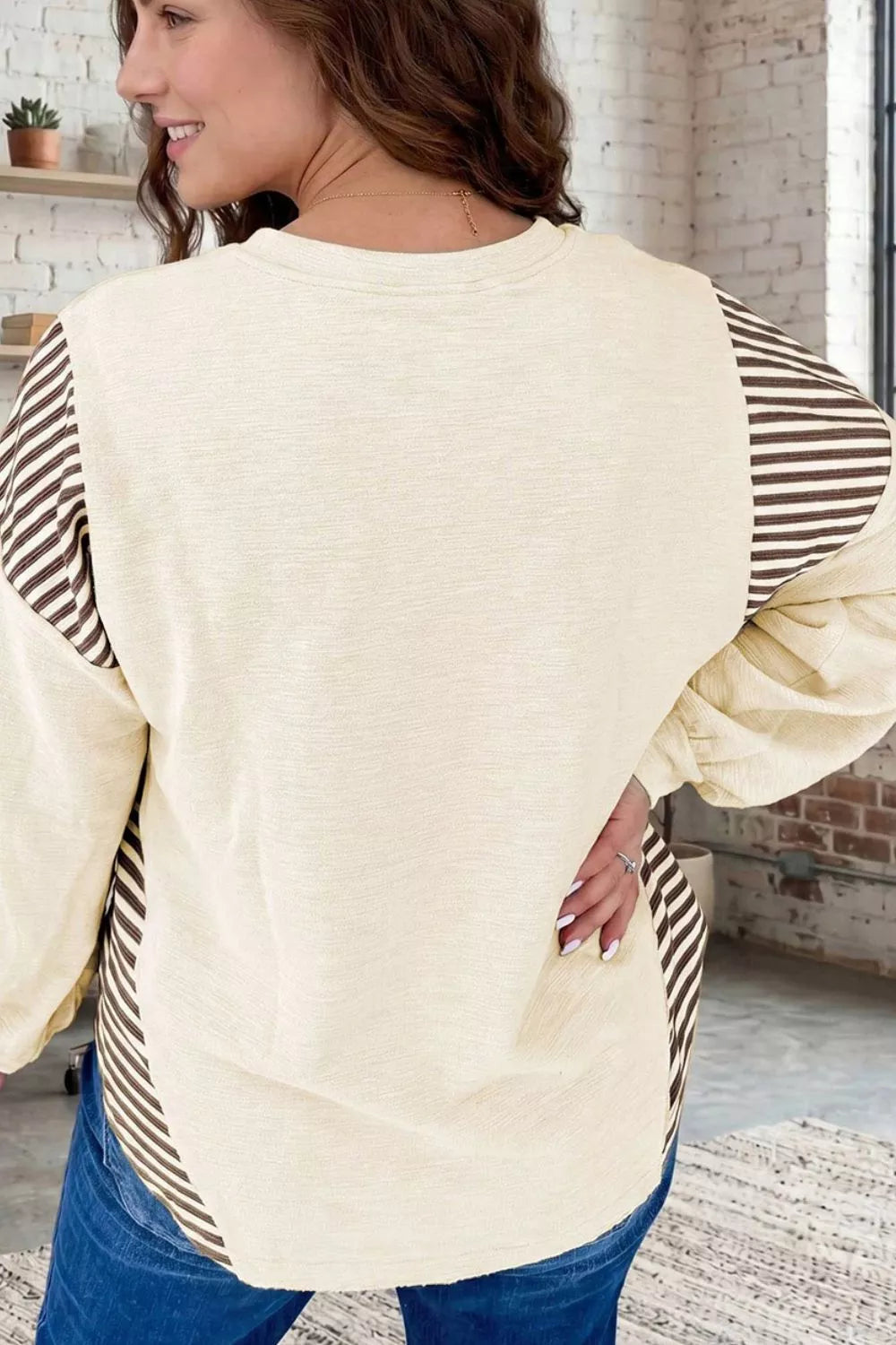 dark brown pullover sweater featuring graphic print and graphic-print, striped