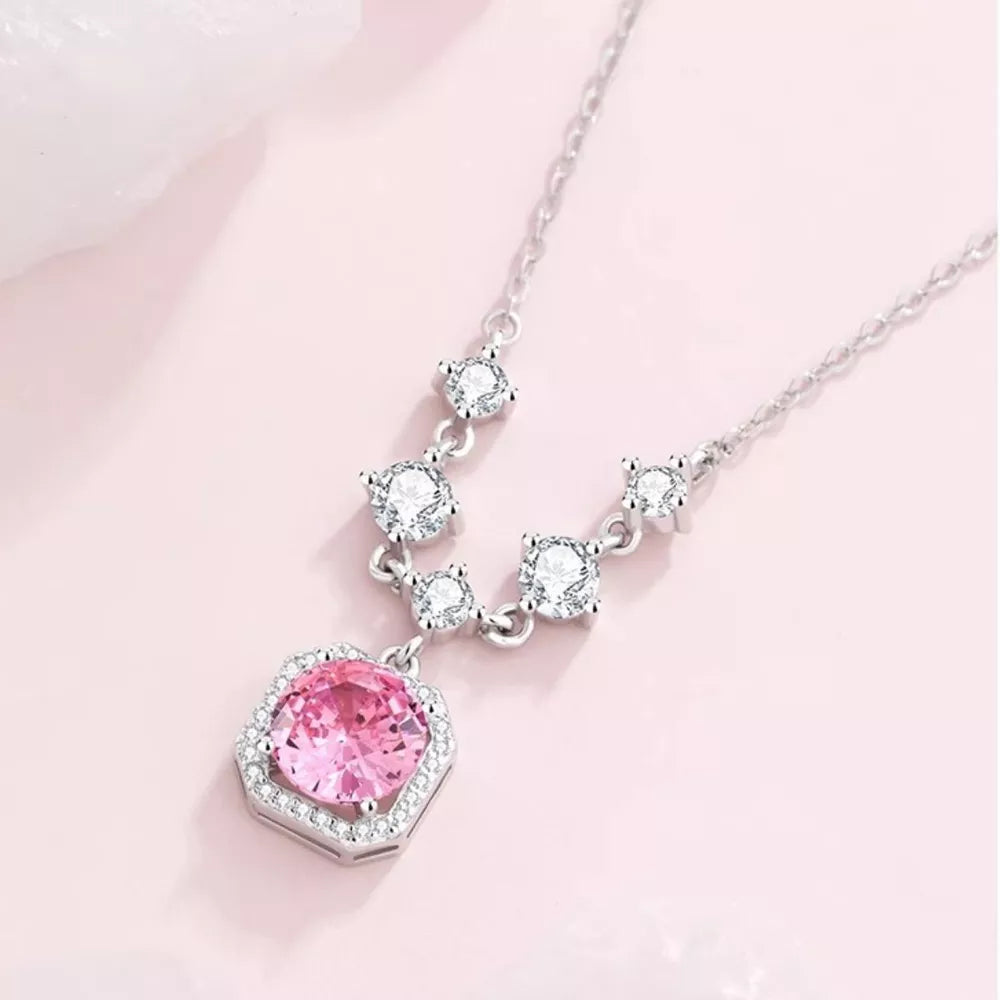 925 sterling silver,Zircon Care instructions: Avoid wearing during exercise, as necklace in pink with pendant silhouette