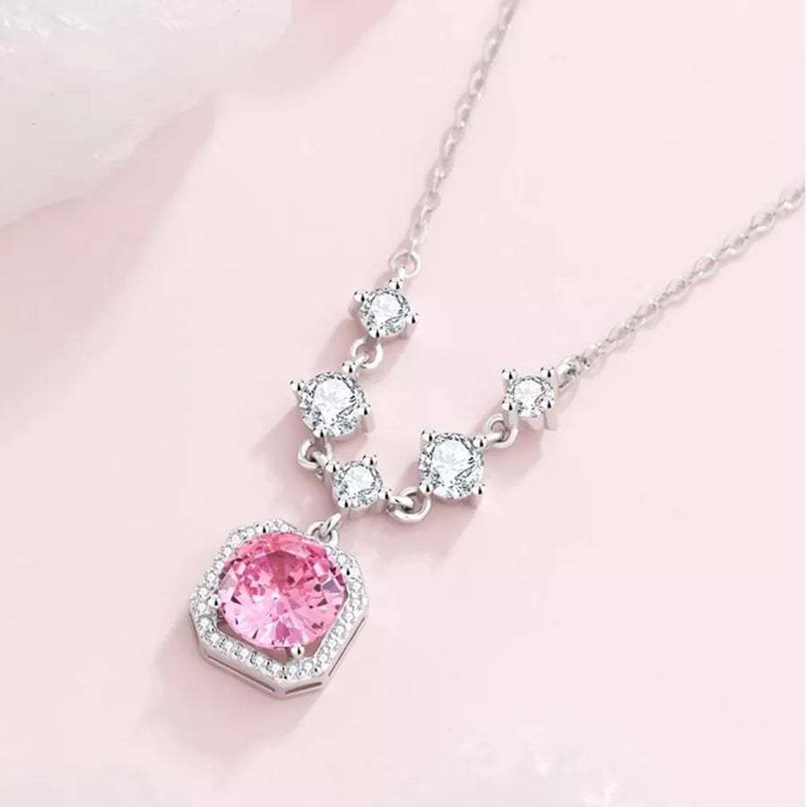 925 sterling silver,Zircon Care instructions: Avoid wearing during exercise, as necklace in pink with pendant silhouette