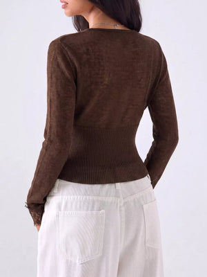 cream cardigan with button-front and ribbed