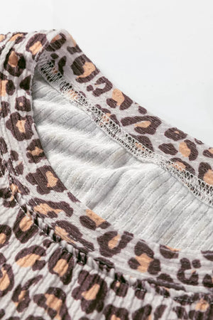 Leopard print ribbed loungewear set with crew neck detail.