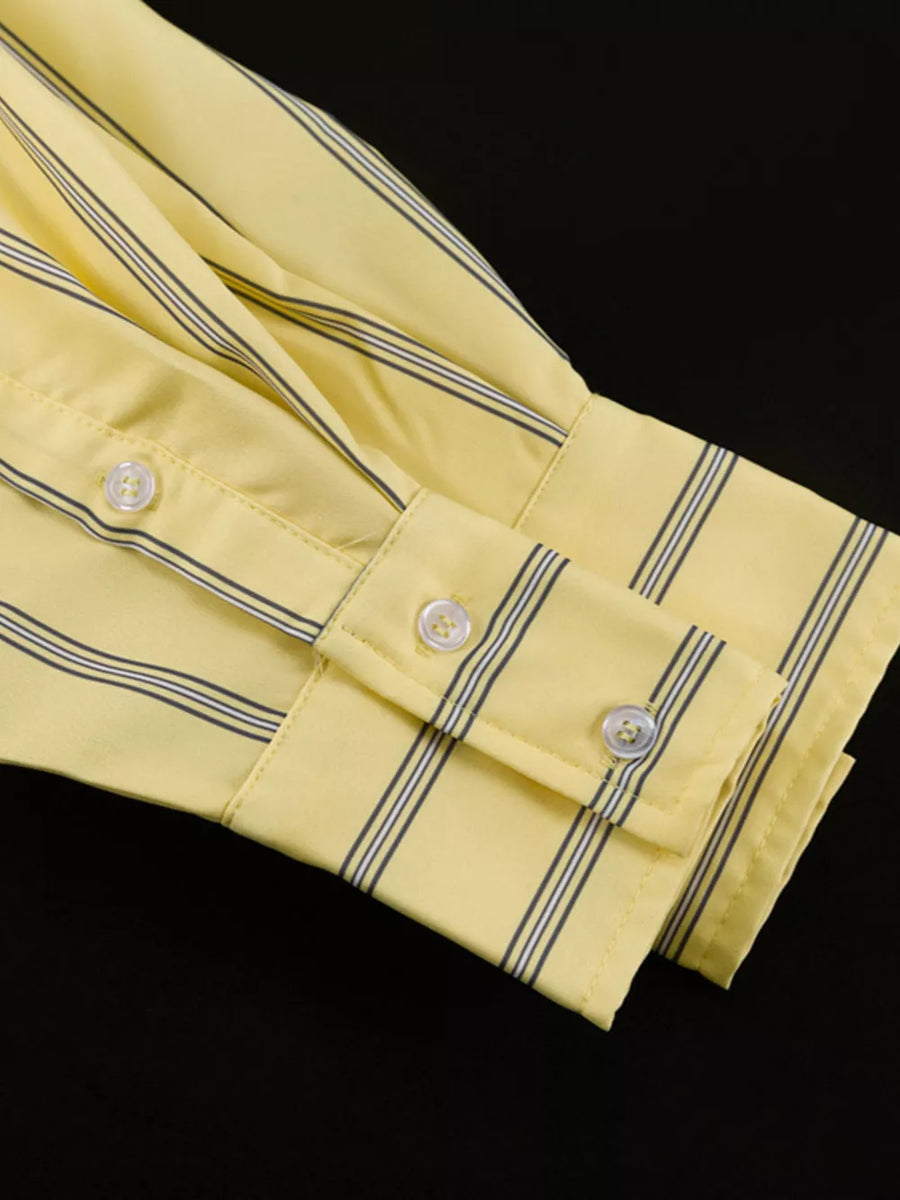 Yellow striped button-up shirt with white buttons and folded cuffs.