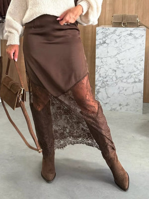 Women's brown midi skirt with lace trim detail and satin finish.
