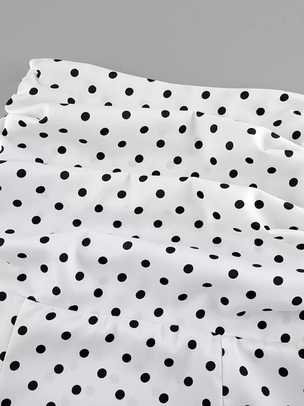 maxi skirt featuring polka dot in black with 100% polyester Care instructions: Machine wash cold texture