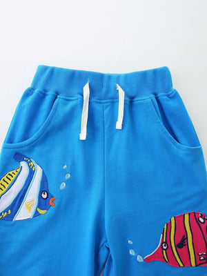 Blue cotton toddler shorts with fish embroidery and drawstring waist
