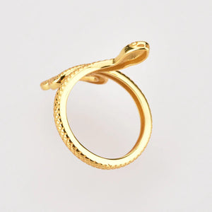 Gold coiled serpent ring with textured scales and detailed head.