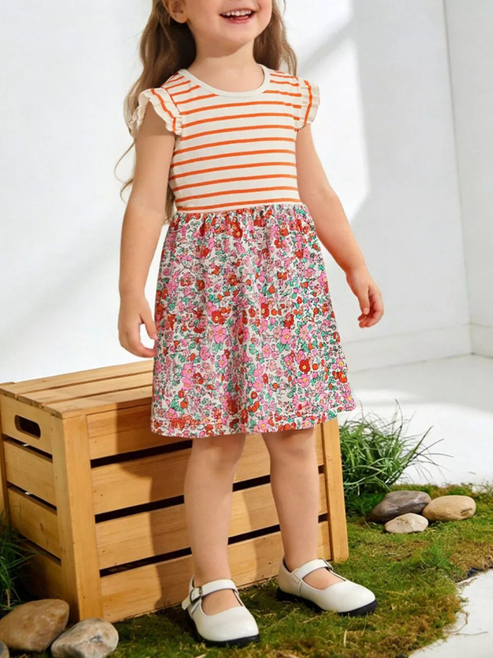 Baby dress with orange stripes and floral skirt, ruffle sleeves